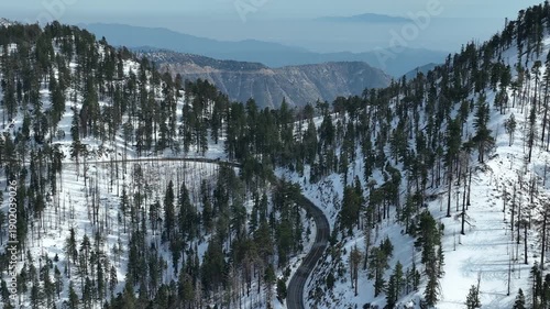 Wallpaper Mural Angeles Crest Highway at Snowcrest Aerial Shot of Winter Snow Forest Telephoto Orbit L California USA Torontodigital.ca