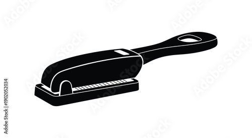 A stark black silhouette depicts a classic office stapler showcasing its functional design and form silhouette high quality