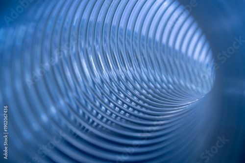 Billede på lærred abstract blue background with lines, flexi pipeline inside