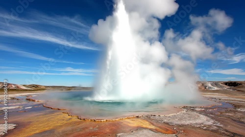 Wallpaper Mural Spectacular Geyser Erupting in Iceland with Blue Sky and Clouds. Torontodigital.ca
