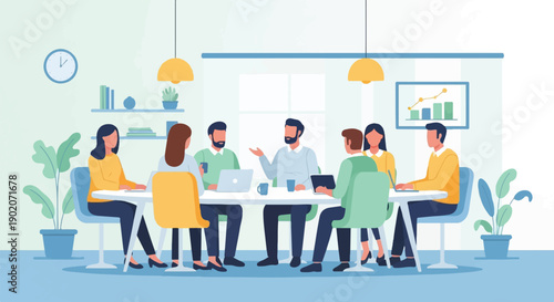 Diverse team collaborates around a table with laptops and charts