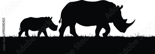 Silhouette of a mother rhinoceros and calf walking together isolated on transparent background