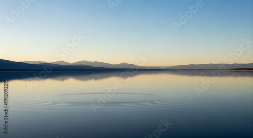 Wallpaper Mural Calm lake reflecting soft sunrise light in peaceful atmosphere. Torontodigital.ca