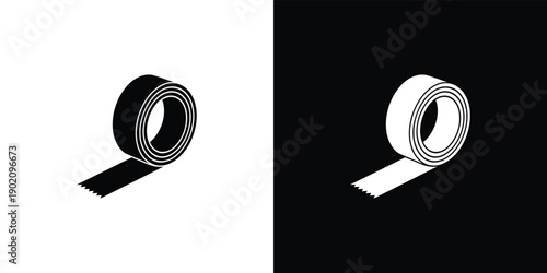 A roll of white masking tape on a light gray background for household and office use