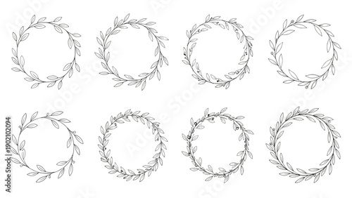 Set of eight different circular botanical wreaths made of delicate branches and leaves in a black and white sketch style.