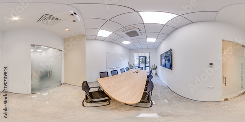 Cuadro en lienzo Full 360 degree view of a bright and clean corporate meeting room featuring a large wooden table black chairs white walls and modern office equipment