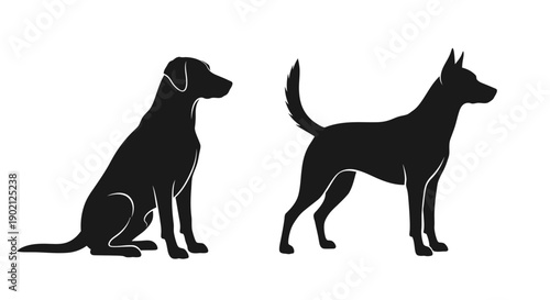 Two black dog silhouettes, one sitting and one standing, against a white background.