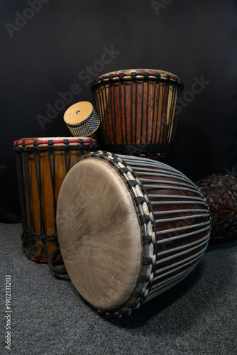 Traditional African Djembe and Dundun Drums in Studio Lighting