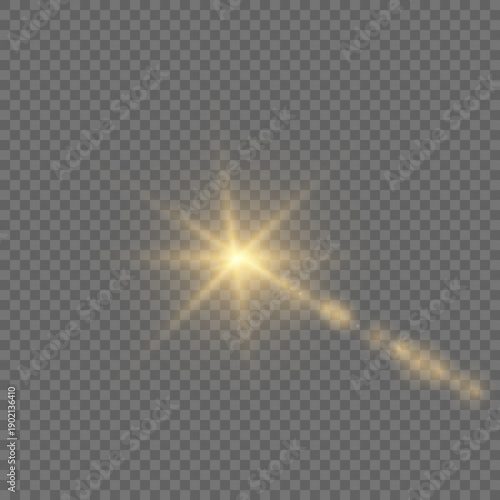 Golden lens flare light effect with sun rays on black background,