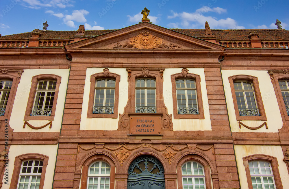 Fototapeta premium Ornate historic government palace facade with classical windows and stone details in Colmar.