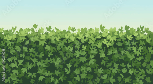 Lush green foliage forms a dense border against a pale, hazy sky