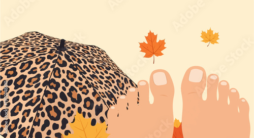 Leopard print umbrella protects toes amidst falling autumn leaves