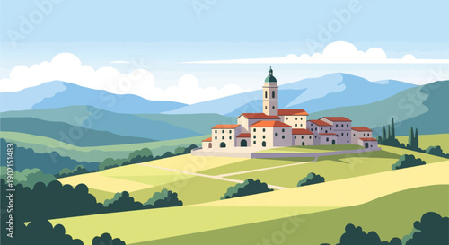 Idyllic village nestled amongst rolling hills and distant mountains