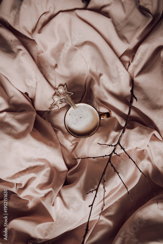 close up of a female hand holding a coffee cup