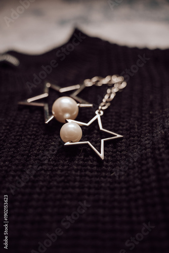 pearl necklace on a black background