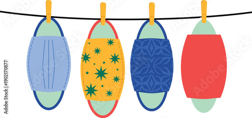 Colorful decorative lanterns hanging on a string with wooden clothespins