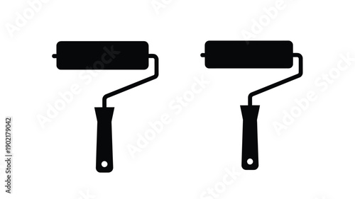 Two black paint rollers displayed against a plain white background