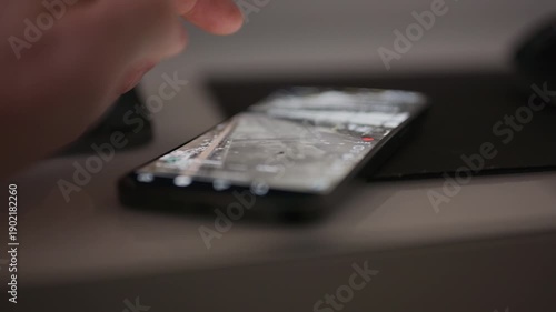 Close up video of liking a social media post where the heart icon is in sharp focus and the background interface is blurred, illustrating digital engagement online interaction and modern mobile app be