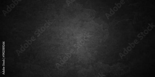 Dark charcoal grunge wall texture background. Dark black rough grunge surface with smoke edge. Black texture chalk board and black board.