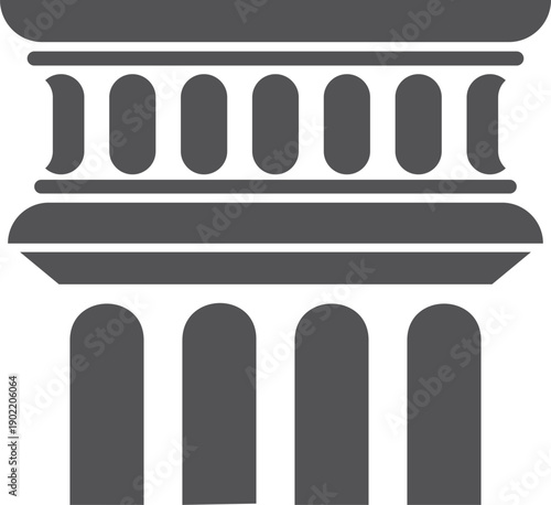 A building with four pillars and a large archway