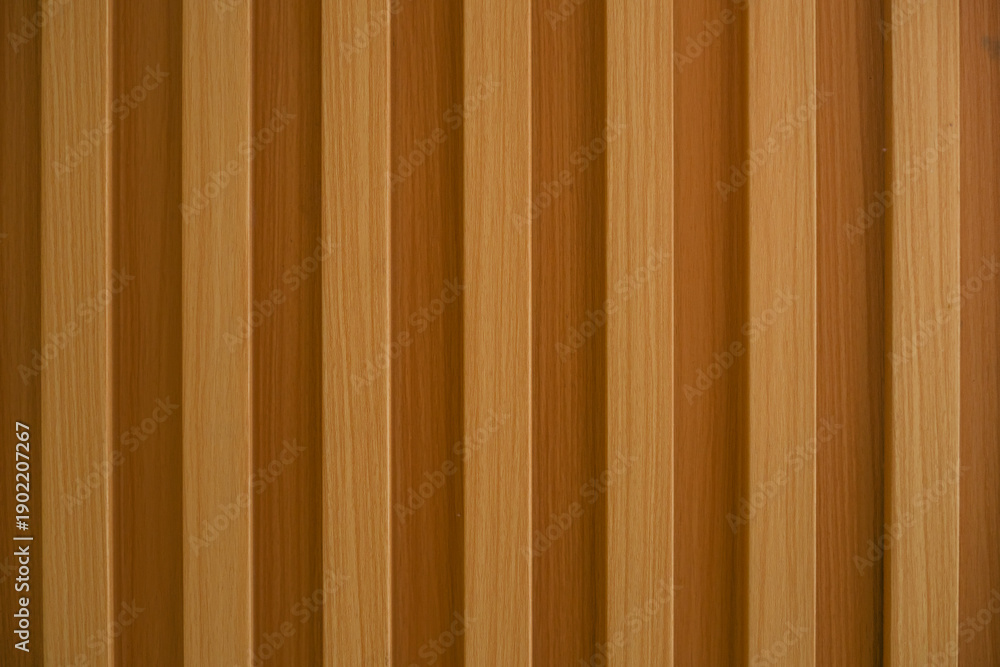 Obraz premium Vertical wooden slat wall texture background with natural warm tone, modern interior design pattern and decorative panel surface.