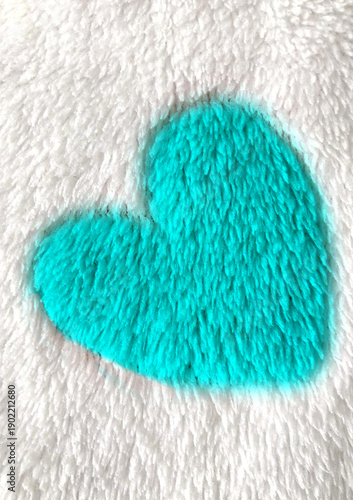 blue heart on white furry background