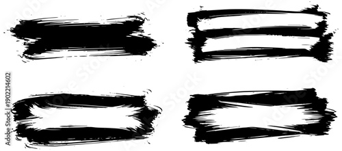 Set of four black brush stroke elements for design
