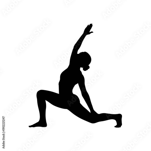 Silhouette of a woman practicing yoga in a lunge position.
