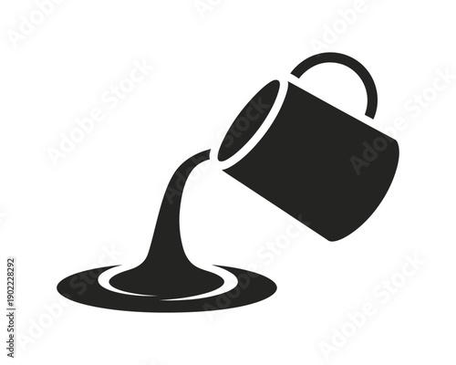 A black mug pouring liquid into a puddle on a white background