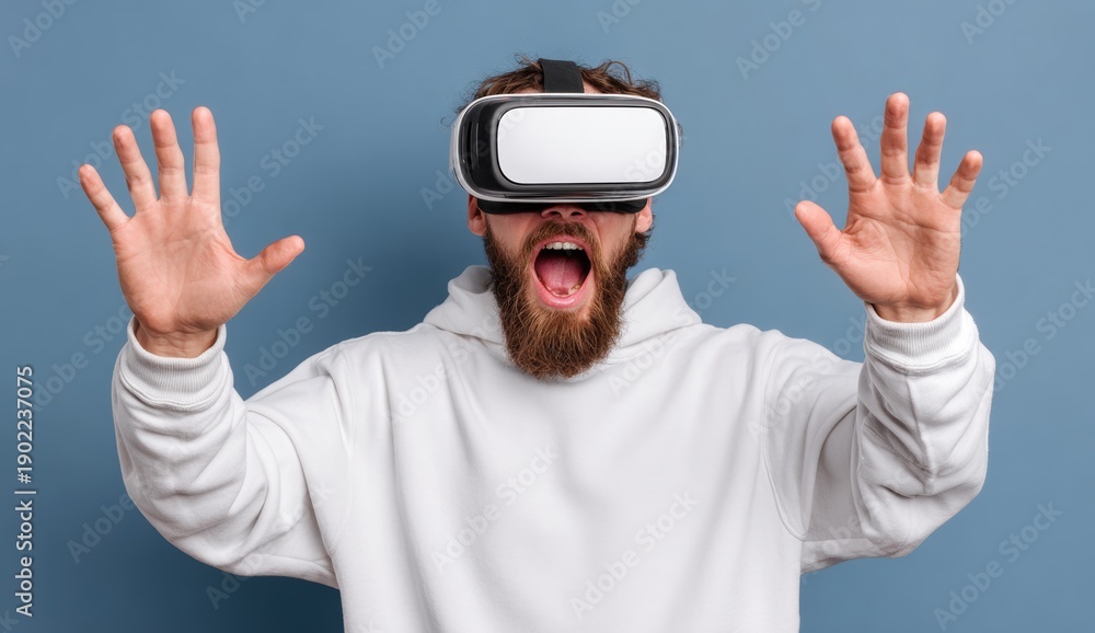 Naklejka premium The young man revels in virtual reality, feeling excitement and joy