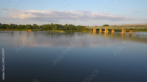 Wallpaper Mural a train on a bridge over a river in the city Torontodigital.ca