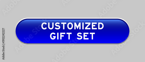 Blue color capsule shape button with word customized gift set on gray background