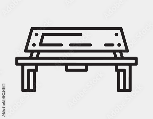 Industrial ironing board with a metal frame and a flat surface