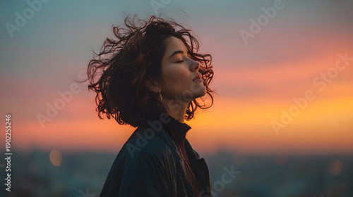 Woman Enjoying Deep Breath at Sunset with Soft Copy Space