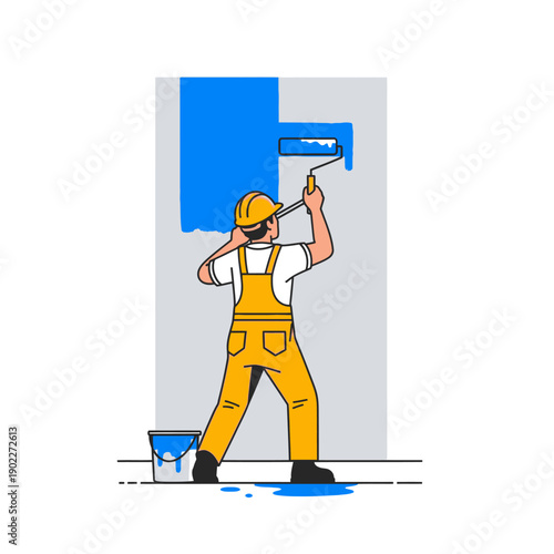 Painter in yellow overalls painting wall with blue color using roller