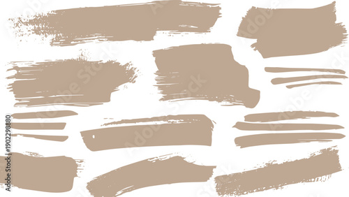 Collection of beige brush strokes and paint splatters