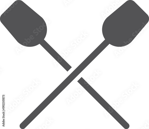 Two paddles are crossed over each other