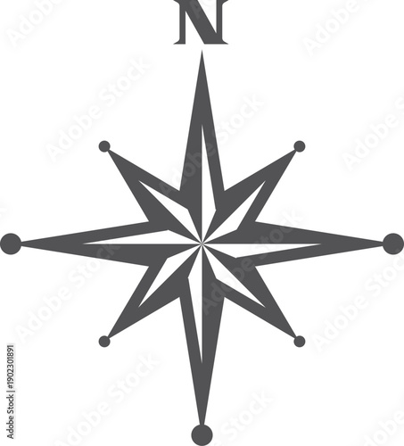 A black and white compass with the letter N on it