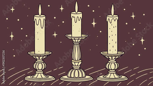 Elegant candles on ornate holders with warm glow
