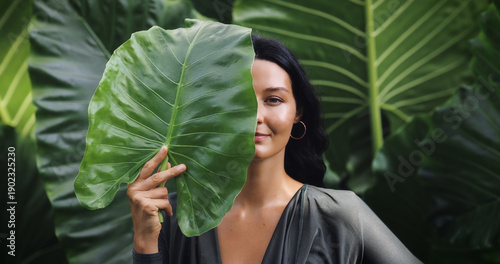 Close-Up Beauty Portrait With Leaf Covering Face for Skincare Concept
