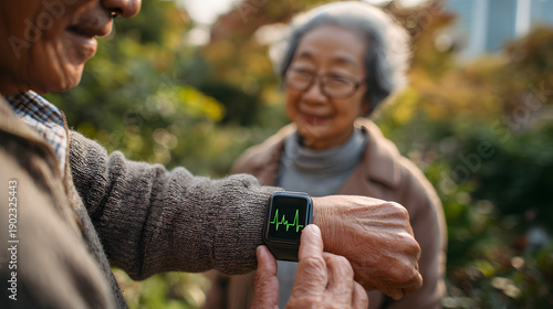 Detail of elderly person using smart watch to monitor pulse during workout, healthcare and gadget concept.