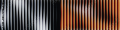 A striking image of a gradient transitioning from black and white to orange stripes