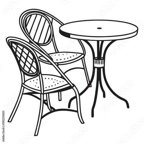 A pair of chairs and a table set up for a cozy outdoor meal.