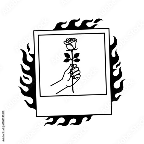 Hand holding a burning rose in a polaroid frame
