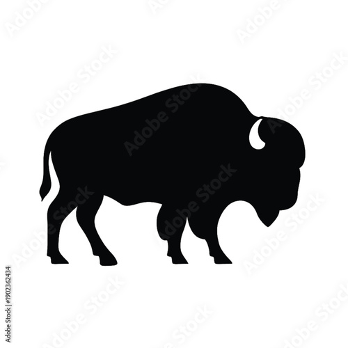 Subtle dark bison silhouette vector illustration, an iconic symbol of powerful wildlife and strength, isolated on a dark background, representing wild nature and resilient spirit.