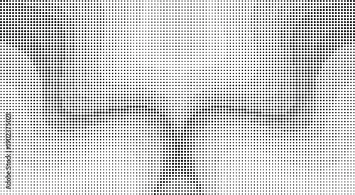 Black and white halftone dot pattern with varying density and size dots
