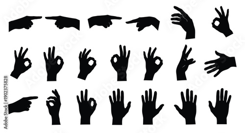 Collection of black silhouette human hand gestures including pointing and ok signs