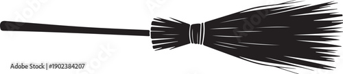 Black Broom with Straw Bristles on White Background