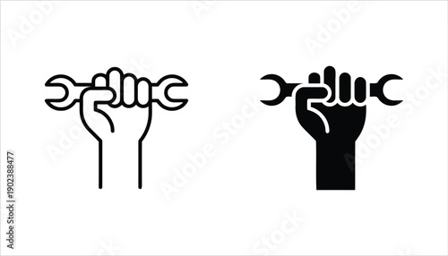 Fist holding wrench icon outline and solid style.