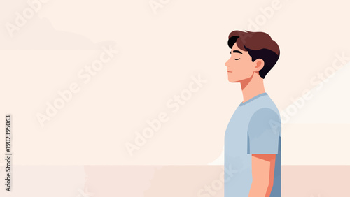 A man is walking on a sidewalk with his head down. He is wearing a blue shirt and he is in a contemplative mood